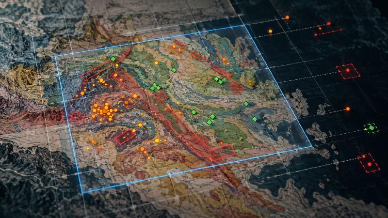 Artificial intelligence in geology overlay: earthquakes as orange points, faults as red boxes and mineral finds as green markers inside a blue search box on a scanned geologic map, with results outside the box set aside